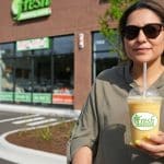 photo of a woman standing casually outside Fresh Healthy Café